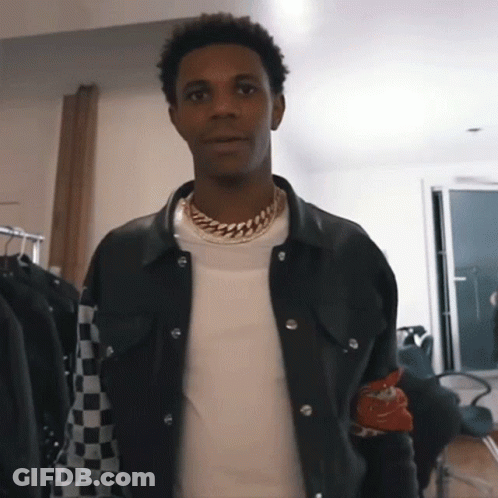 A Man Wearing A Black Jacket And A White Shirt GIF