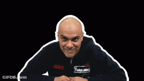 A Man Wearing A Black Jacket With The Word Staff On The Front GIF