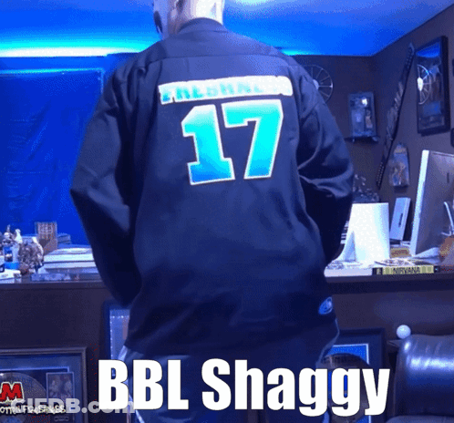 A Man Wearing A Black Jersey With The Number 17 On The Back GIF