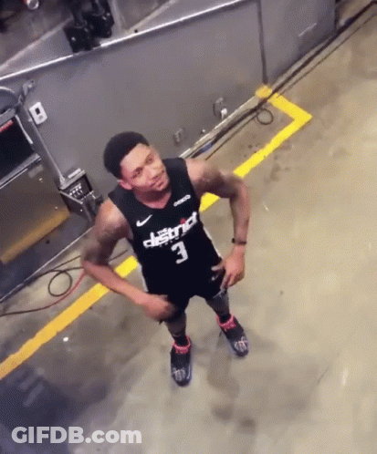 A Man Wearing A Black Jersey With The Number 3 GIF