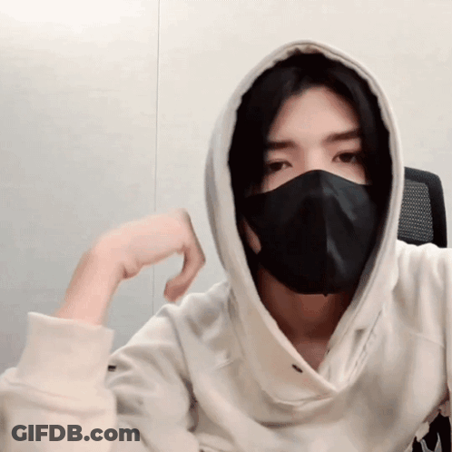 A Man Wearing A Black Mask And A Hoodie GIF