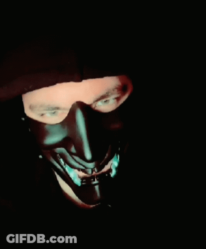 A Man Wearing A Black Mask With The Words " Behave Yourself " On The Bottom GIF