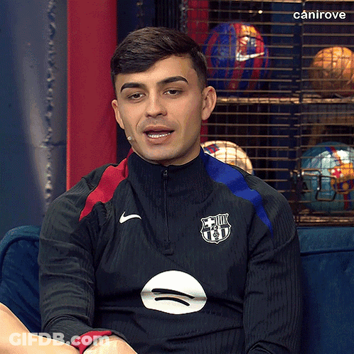 A Man Wearing A Black Nike Sweatshirt With A Fcb Logo On It GIF