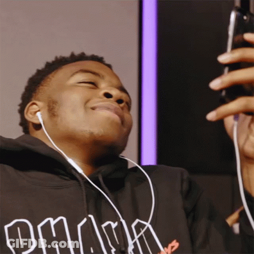 A Man Wearing A Black Omaha Hoodie Takes A Picture Of Himself GIF