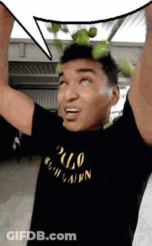 A Man Wearing A Black Polo Ralph Lauren T-Shirt Holds Up His Arms GIF