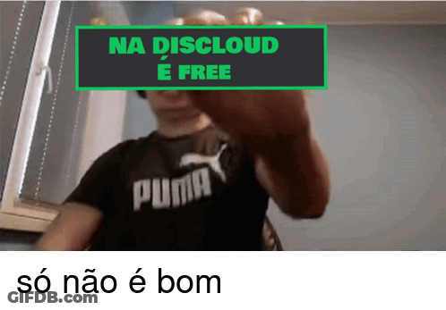 A Man Wearing A Black Puma Shirt Is Standing In Front Of A Sign That Says Na Disccloud E Free GIF