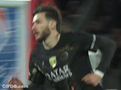A Man Wearing A Black Qatar Airways Shirt Is Running GIF