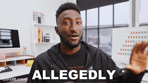 A Man Wearing A Black Shirt And A Black Jacket Says Allegedly GIF