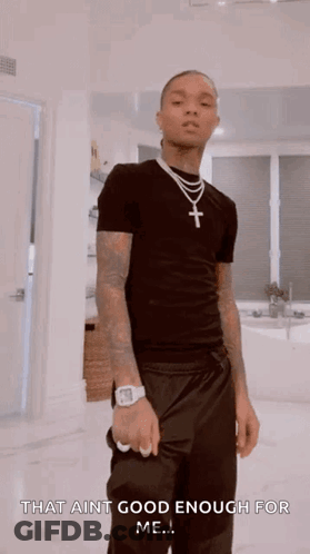 A Man Wearing A Black Shirt And A Cross Necklace Says That Ain T Good Enough For Me .. GIF
