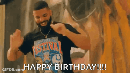 A Man Wearing A Black Shirt Is Dancing In Front Of A Painting And Says `` Happy Birthday '' . GIF