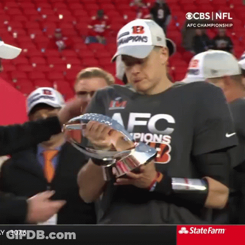 A Man Wearing A Black Shirt That Says Afc Champions On It GIF