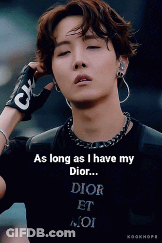 A Man Wearing A Black Shirt That Says " As Long As I Have My Dior ... " GIF