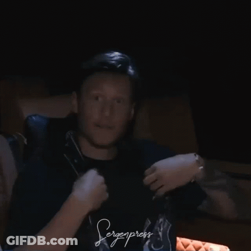 A Man Wearing A Black Shirt That Says Bergenpress GIF