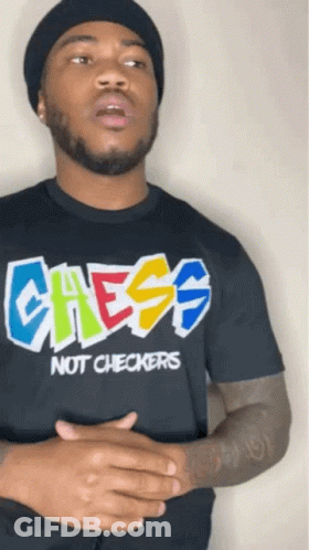 A Man Wearing A Black Shirt That Says Chess Not Checkers On It GIF