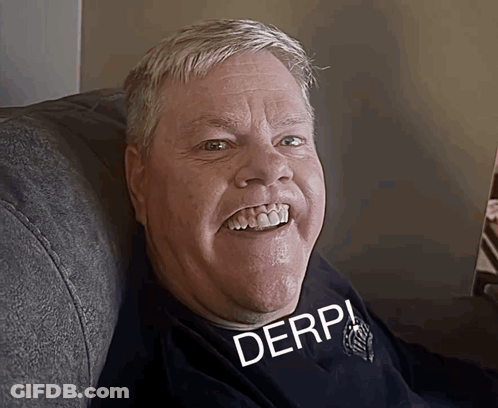 A Man Wearing A Black Shirt That Says Derp On It GIF