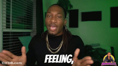 A Man Wearing A Black Shirt That Says Feeling On It GIF