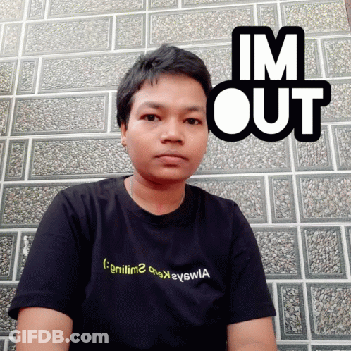 A Man Wearing A Black Shirt That Says ' Gniiim2 ' On It GIF