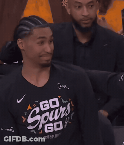 A Man Wearing A Black Shirt That Says Go GIF