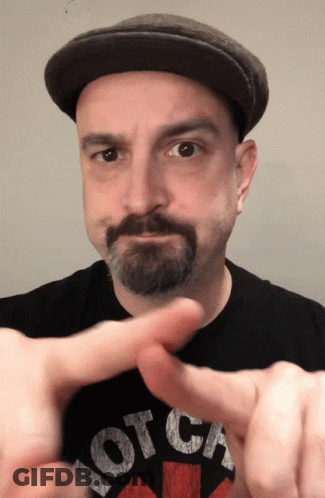 A Man Wearing A Black Shirt That Says Hot Ca GIF