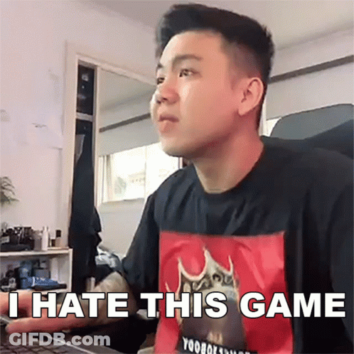 A Man Wearing A Black Shirt That Says I Hate This Game Is Sitting In Front Of A Computer GIF