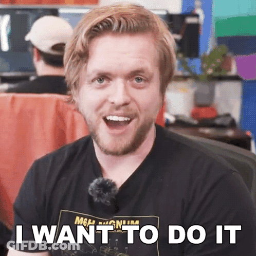 A Man Wearing A Black Shirt That Says I Want To Do It On It GIF