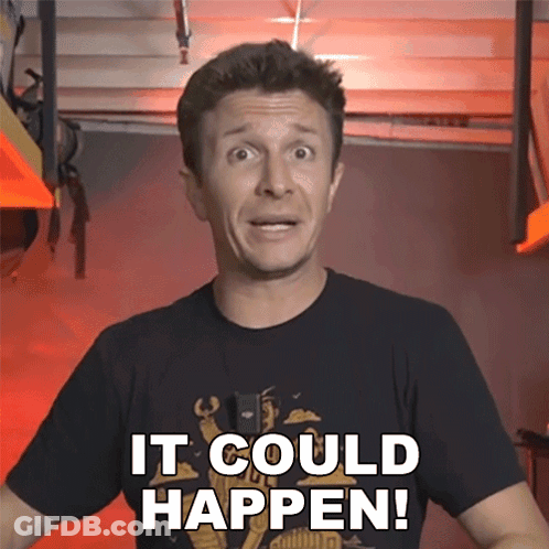 A Man Wearing A Black Shirt That Says It Could Happen On It GIF