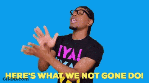 A Man Wearing A Black Shirt That Says Iya Is Clapping His Hands . GIF