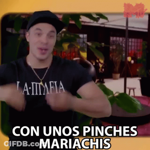 A Man Wearing A Black Shirt That Says La Mafia Is Dancing GIF