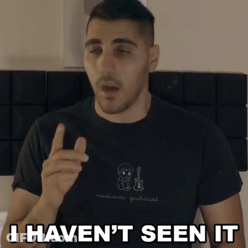 A Man Wearing A Black Shirt That Says Merluere Guitarist Says I Haven 'T Seen It GIF