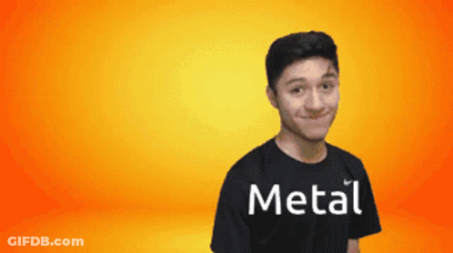 A Man Wearing A Black Shirt That Says Metal GIF
