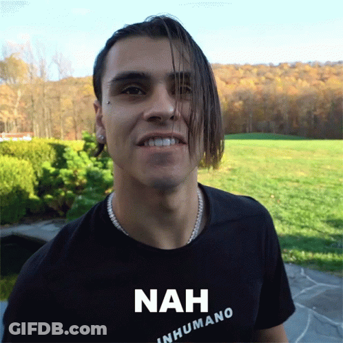 A Man Wearing A Black Shirt That Says Nah GIF