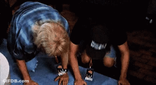 A Man Wearing A Black Shirt That Says Nirvana On It GIF