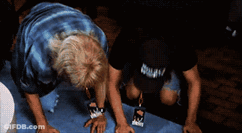 A Man Wearing A Black Shirt That Says Nirvana On It GIF