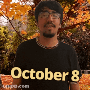 A Man Wearing A Black Shirt That Says October 8 On It GIF