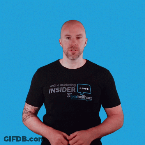 A Man Wearing A Black Shirt That Says Online Marketing Insider On It GIF