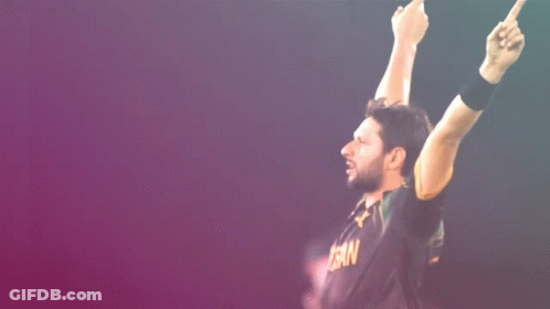 A Man Wearing A Black Shirt That Says ' Pakistan ' On It GIF