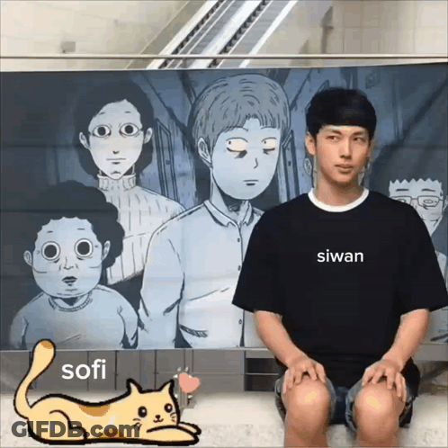 A Man Wearing A Black Shirt That Says Sofi Sits In Front Of A Poster GIF