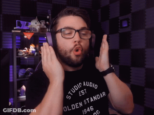 A Man Wearing A Black Shirt That Says Studio Audio On It GIF