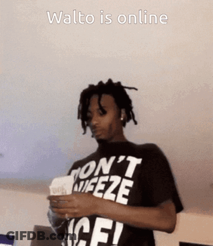 A Man Wearing A Black Shirt That Says Walto Is Online GIF