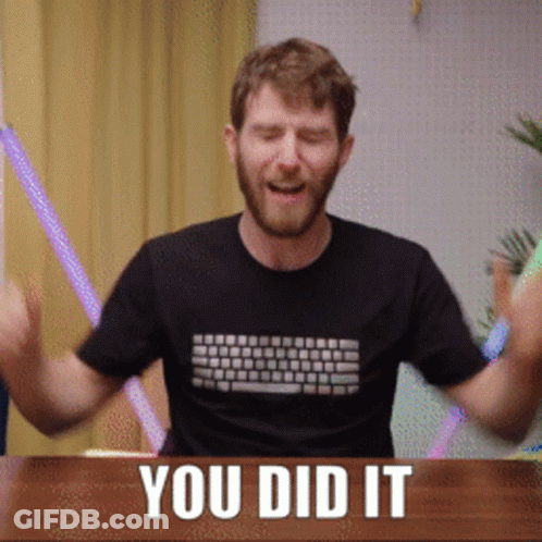 A Man Wearing A Black Shirt That Says " You Did It " On It GIF