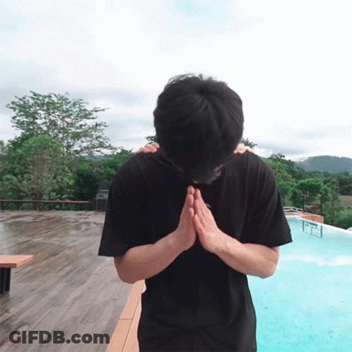 A Man Wearing A Black Shirt With The Letter A On The Front GIF