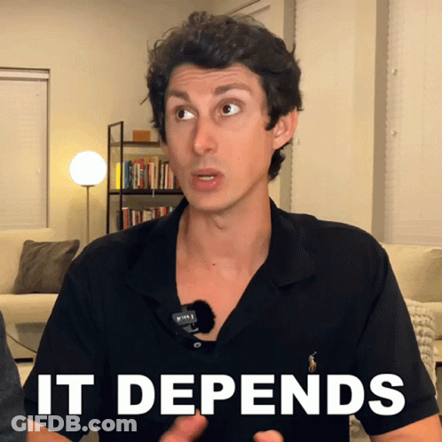 A Man Wearing A Black Shirt With The Word It Depends On His Chest GIF
