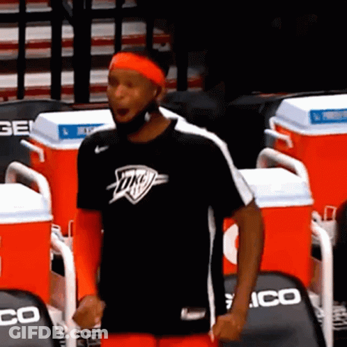A Man Wearing A Black Shirt With The Word Okc On It GIF