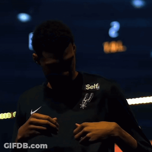 A Man Wearing A Black Shirt With The Word Self On The Front GIF