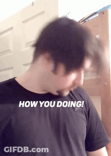 A Man Wearing A Black Shirt With The Words How You Doing On It GIF