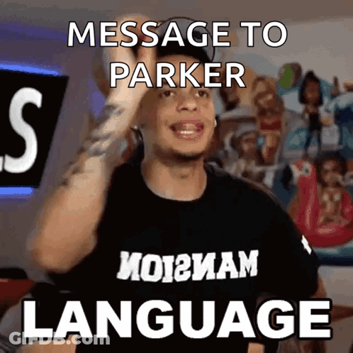 A Man Wearing A Black Shirt With The Words Message To Parker Language On It GIF