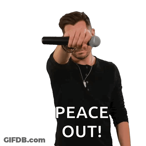 A Man Wearing A Black Shirt With The Words Peace Out On It GIF
