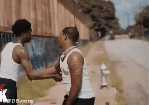 A Man Wearing A Black Shorts With The Letter K On The Side GIF