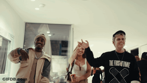 A Man Wearing A Black Sweatshirt That Says The First Time GIF