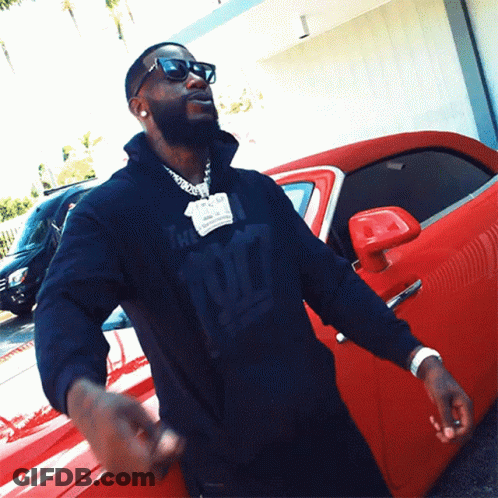 A Man Wearing A Black Sweatshirt With The Number 97 On It GIF